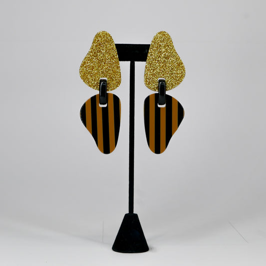 תאומים זהב ופסים